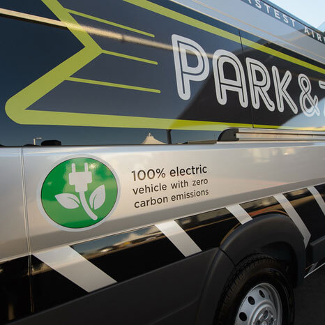 Shuttle fleet comprised of a combination of Ultra-Super Low Gas Emissions diesel shuttles and all-electric shuttles. 