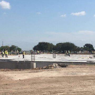 Then the parking surface added over the reinforcement.  Now how's that for reducing land impact?  Two huge functions -- water quality pond & parking spaces -- all in one footprint!
